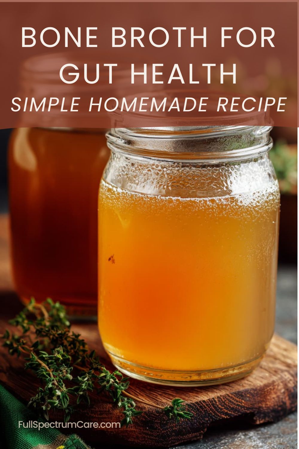 Homemade bone broth in a glass jar, warm and nourishing, prepared as a simple traditional recipe for gut health and digestion