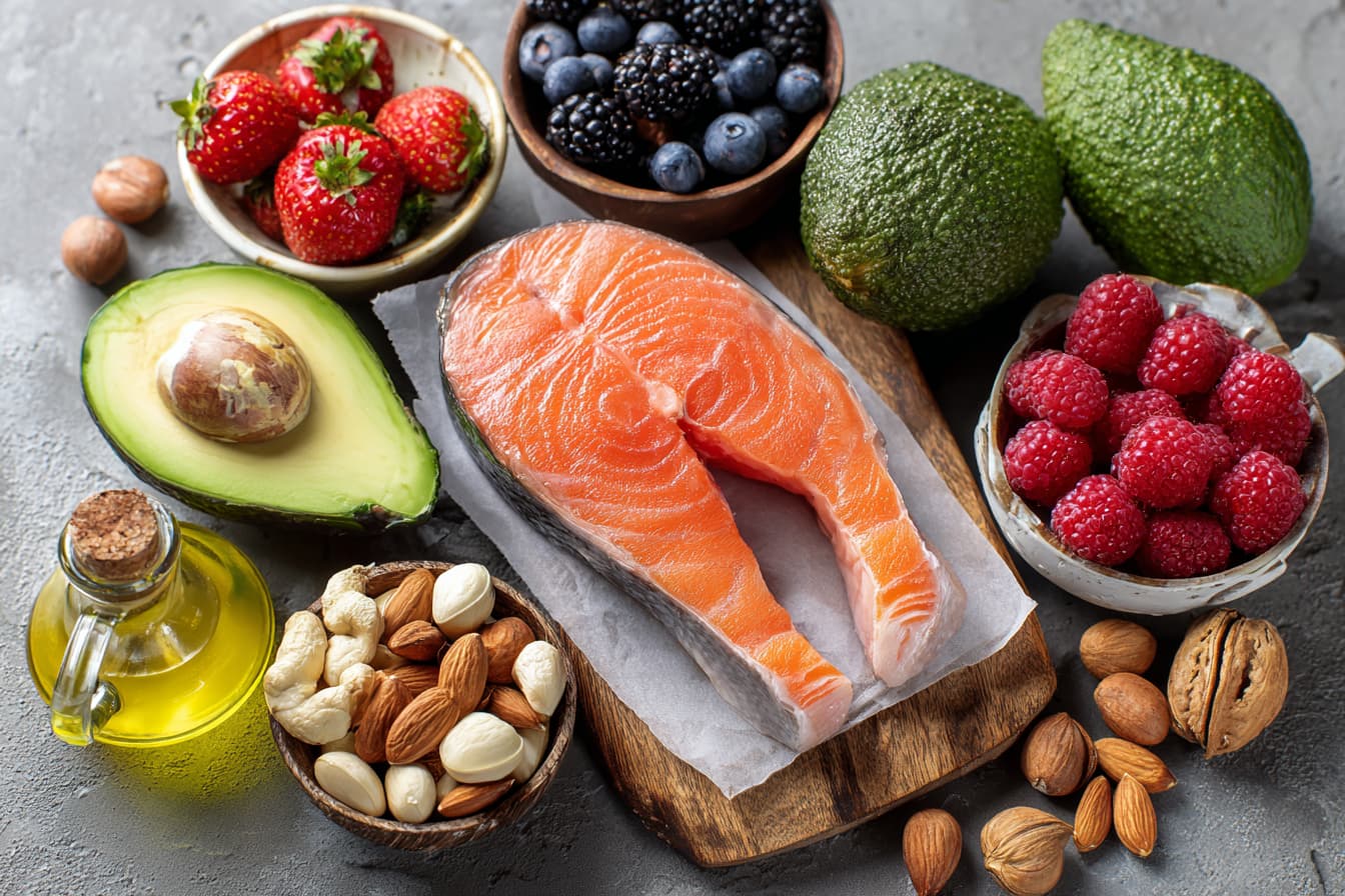 anti inflammatory foods assortment berries avocado salmon nuts olive oil