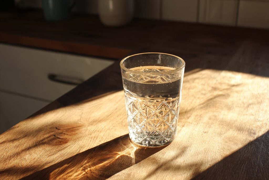 hydration and healthy lifestyle water glass natural light